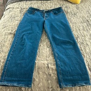Levi’s button fly size 30 ribcage straight ankle jeans.